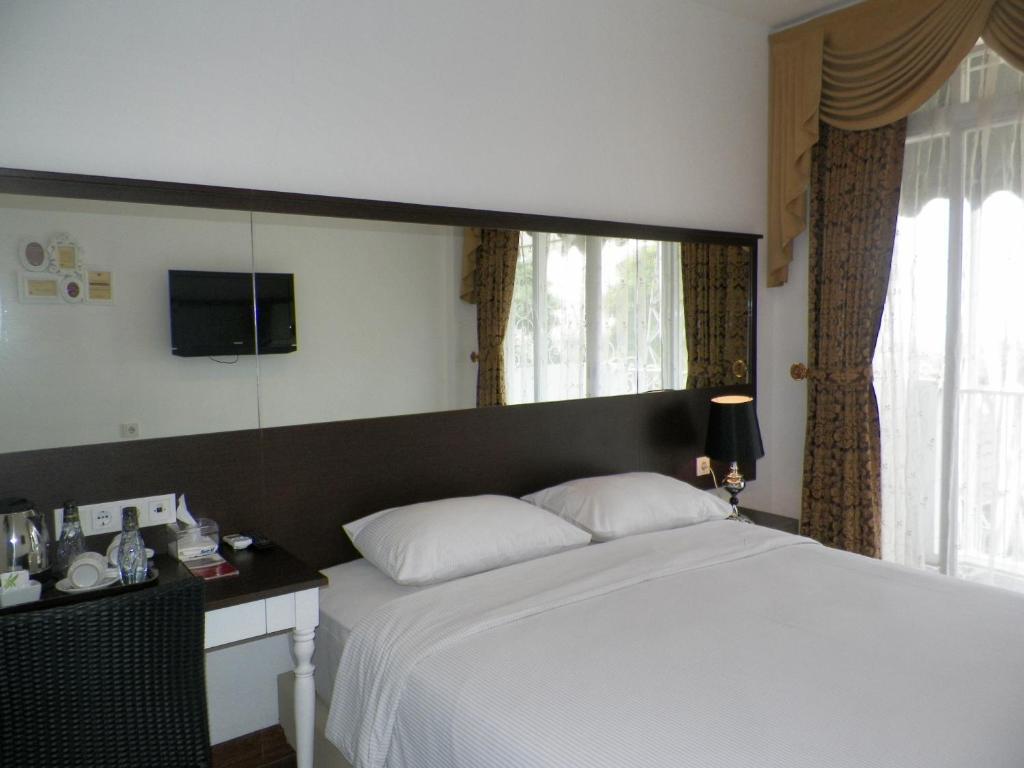 The Victoria Guesthouse Bandung Habitación foto