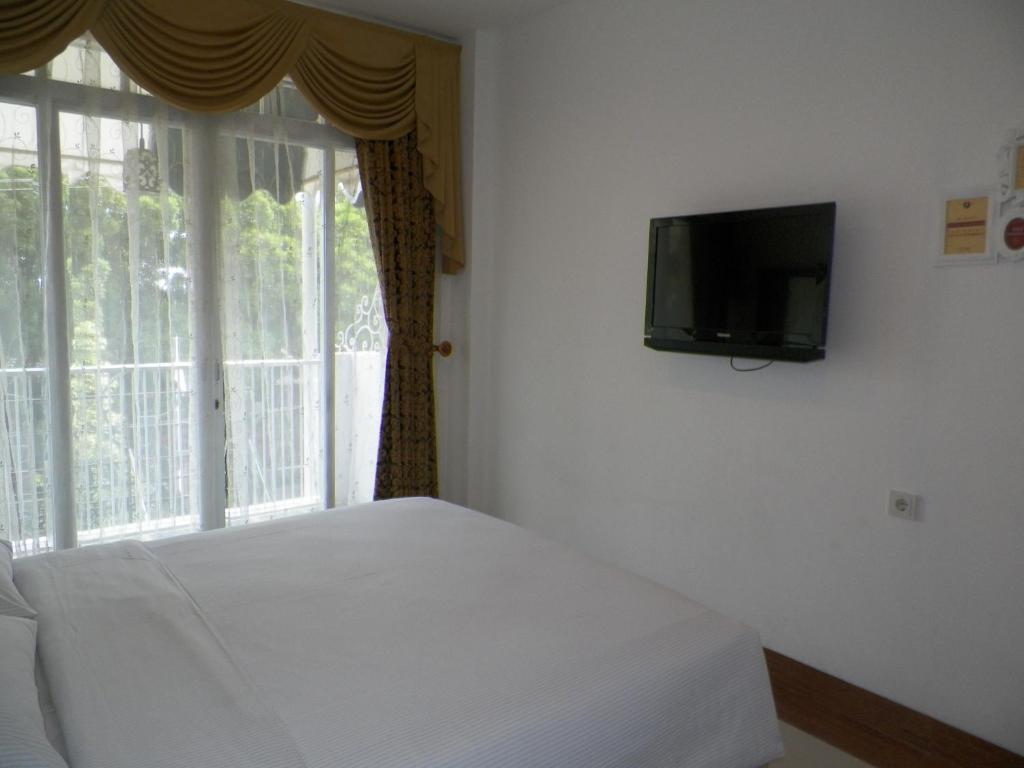 The Victoria Guesthouse Bandung Habitación foto